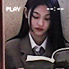 newjeans haerin reading a book in the ditto music video