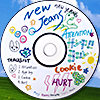 a newjeans cd decorated with marker scribbles with a windows xp bliss wallpaper background