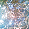 sparkling ocean water with many colors reflected in it