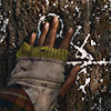 lottie's hand touching the mysterious wilderness symbol from yellowjackets