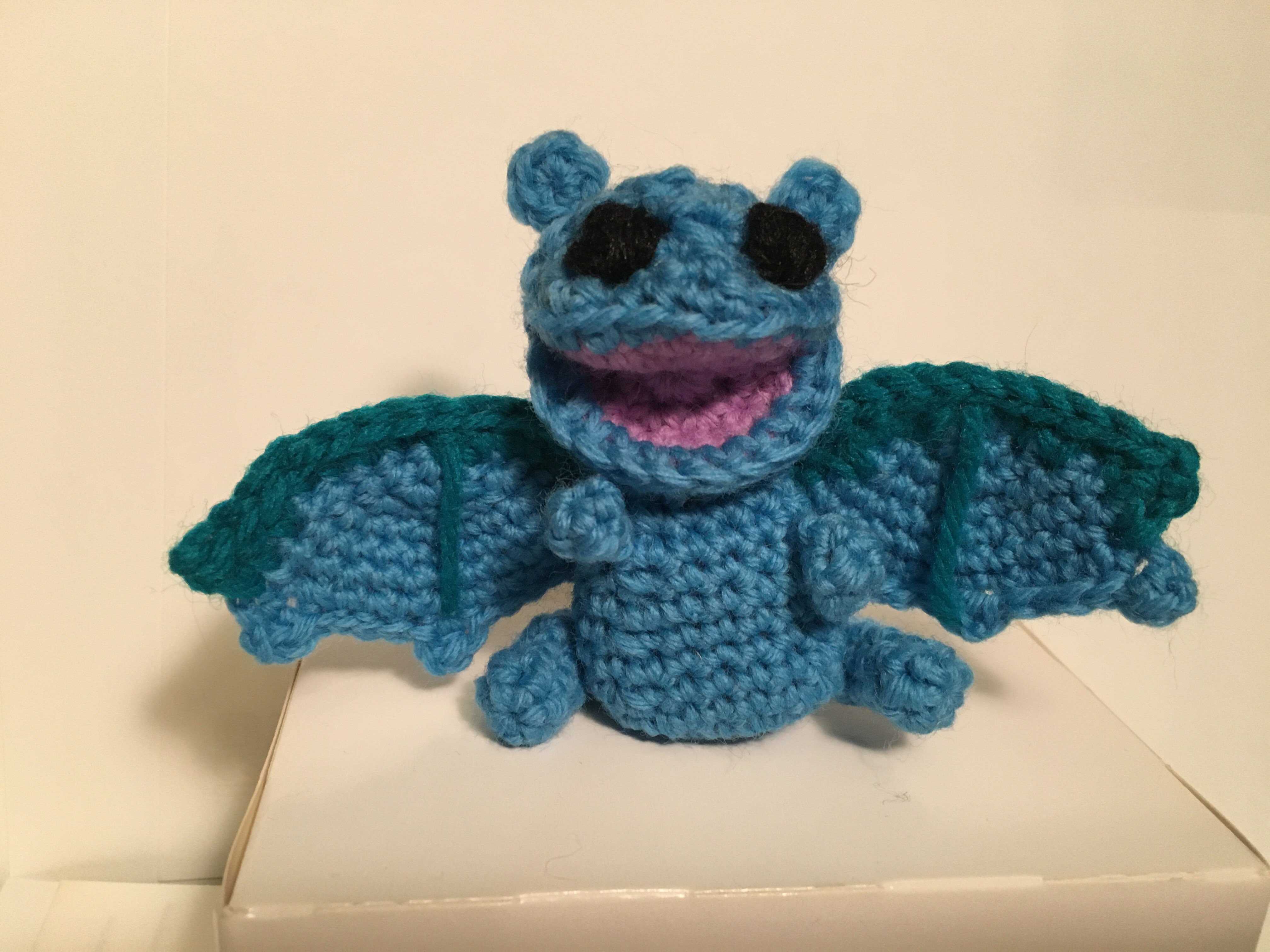 crocheted green dragon