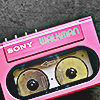 a pink sony cassette walkman