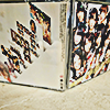 akb48 kamikyokutachi CD jewel case stood upright and open, photo taken from behind at an angle