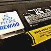 a toy story VHS tape with a sticker on it that says 'be kind rewind'
