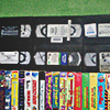 mostly sleeved but some not sleeved VHS tapes gathered together for display