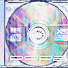 a colorful iridescent CD in a jewel case