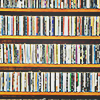 a shelf of a ton of CDs