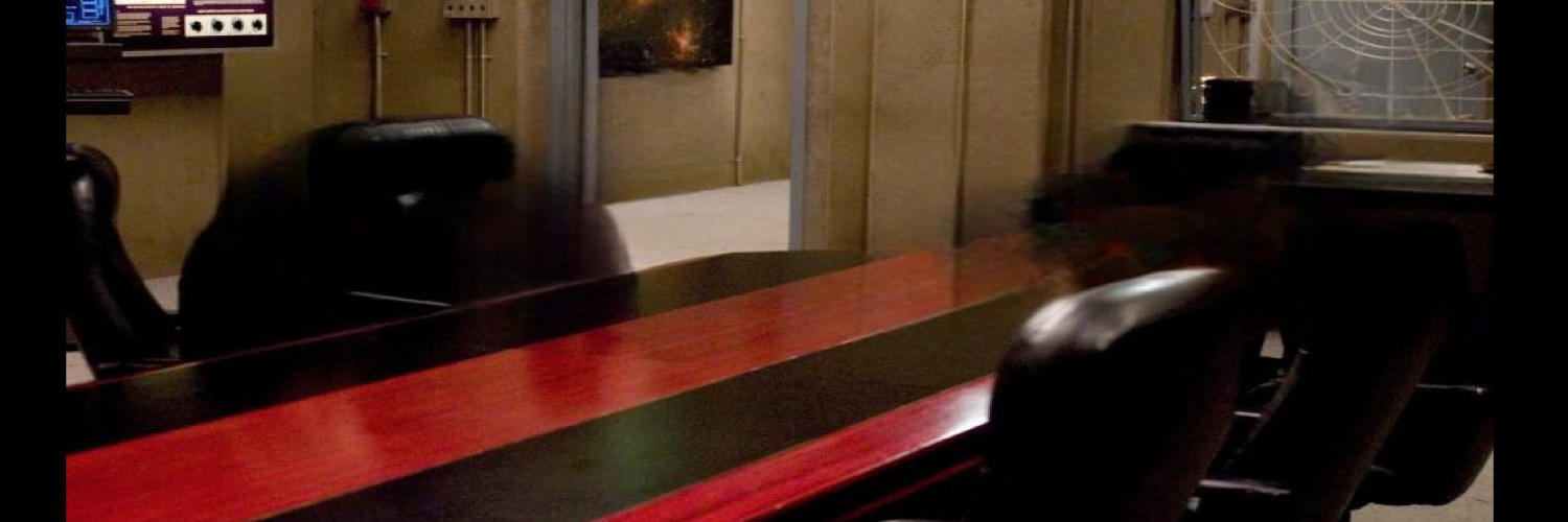 Banner. The conference table.