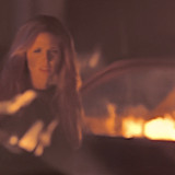 buffy with flames in the background