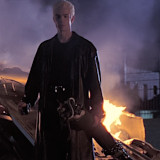 spike with flames behind him