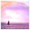 rainbow over the sea with boat