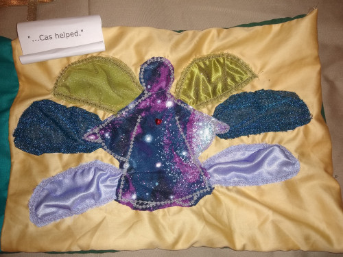 panel 3 seraph angel with six wings applique angel made of galaxy fabric. scroll with words ...Cas helped.