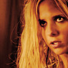 close-up of actress Sarah Michelle Gellar as Buffy Summers with yellow color filter