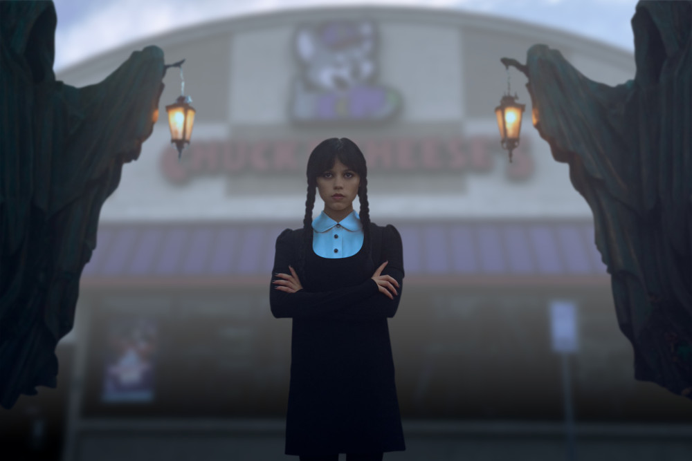 Wednesday blocking the gates to Chuck E Cheese