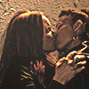 adult van and taissa kissing in yellowjackets
