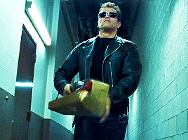 Terminator pulling a shotgun from a box of roses