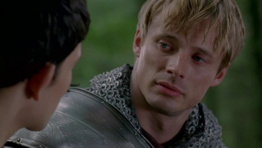 a shot of Arthur staring affectionately at Merlin after Merlins magic has been revealed and Merlin tells Arthur he did not want Arthur to have to choose.