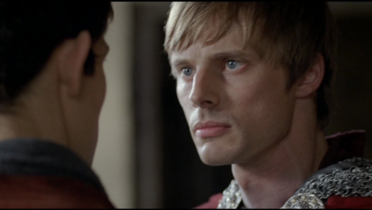 a shot of Arthur looking angry as he tells Merlin to stop bringing up Gwen or he would banish Merlin from Camelot as well