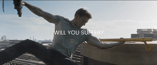 a gif of Steve trying to pull a helicopter out of the air while he holds onto the building and the text on the gif reads in all capitals WILL YOU SUFFER.