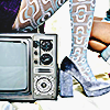 a CRT television with a fashionably dressed person's foot beside it
