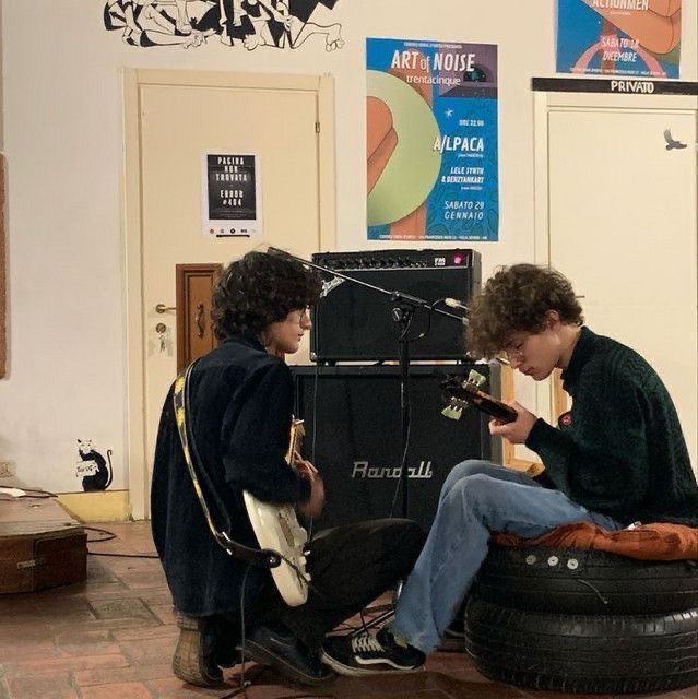boys playing guitar
