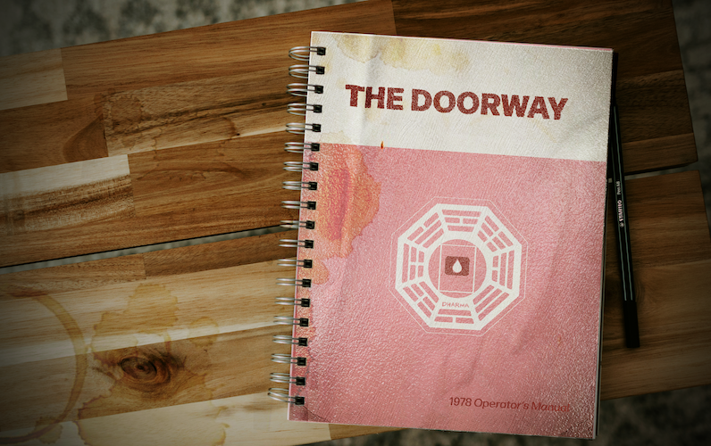 A spiral-bound book with 'The Doorway' written at the top. Below it is an image of the DHARMA logo with a doorway in the middle and the Lumon teardrop logo inside of the doorway. At the bottom, the book says '1978 Operator's Manual'. The cover has water stains.