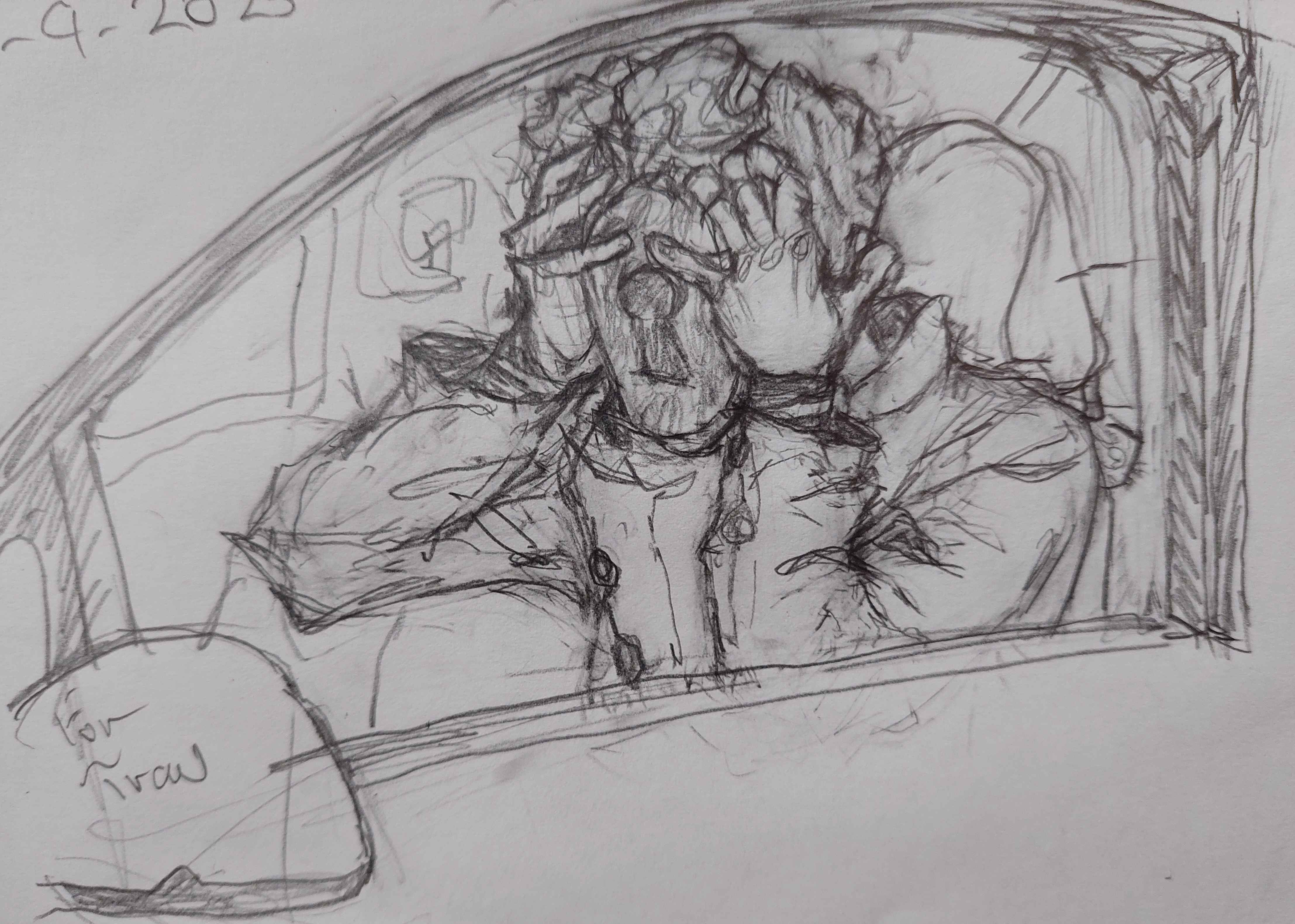 Six in a car, he is clutching at his head, clearly very distressed.