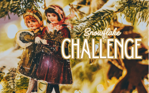 An old-fashioned ornament of two young girls bundled up in coats and walking side by side is nestled amidst pine boughs.