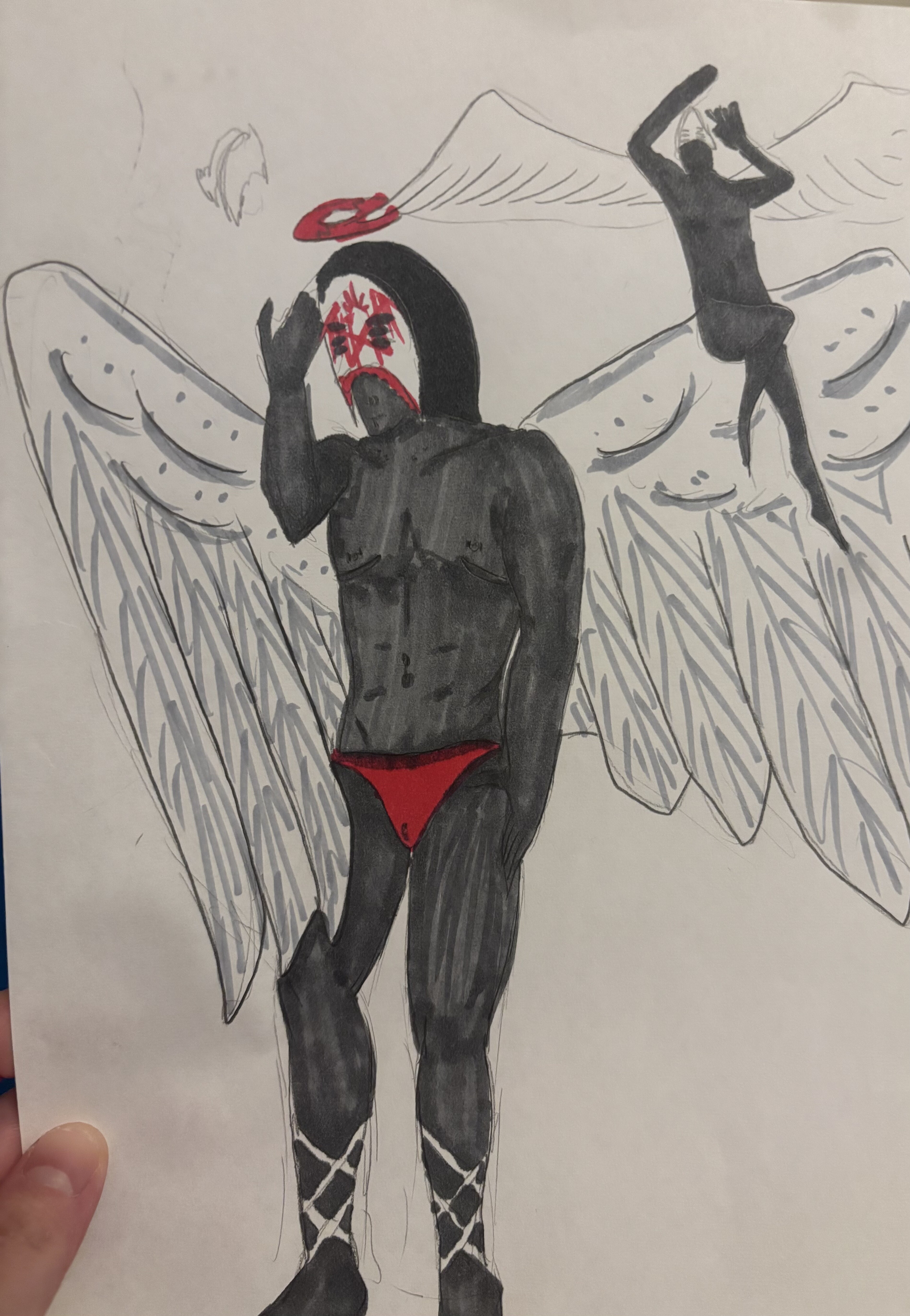 marker drawing of vessel with wings and himself again as an angel on his shoulder - he is wearing red panties you can sorta see his dick piercing though and a few piercings scattered over his body. His top surgery scars are visible.