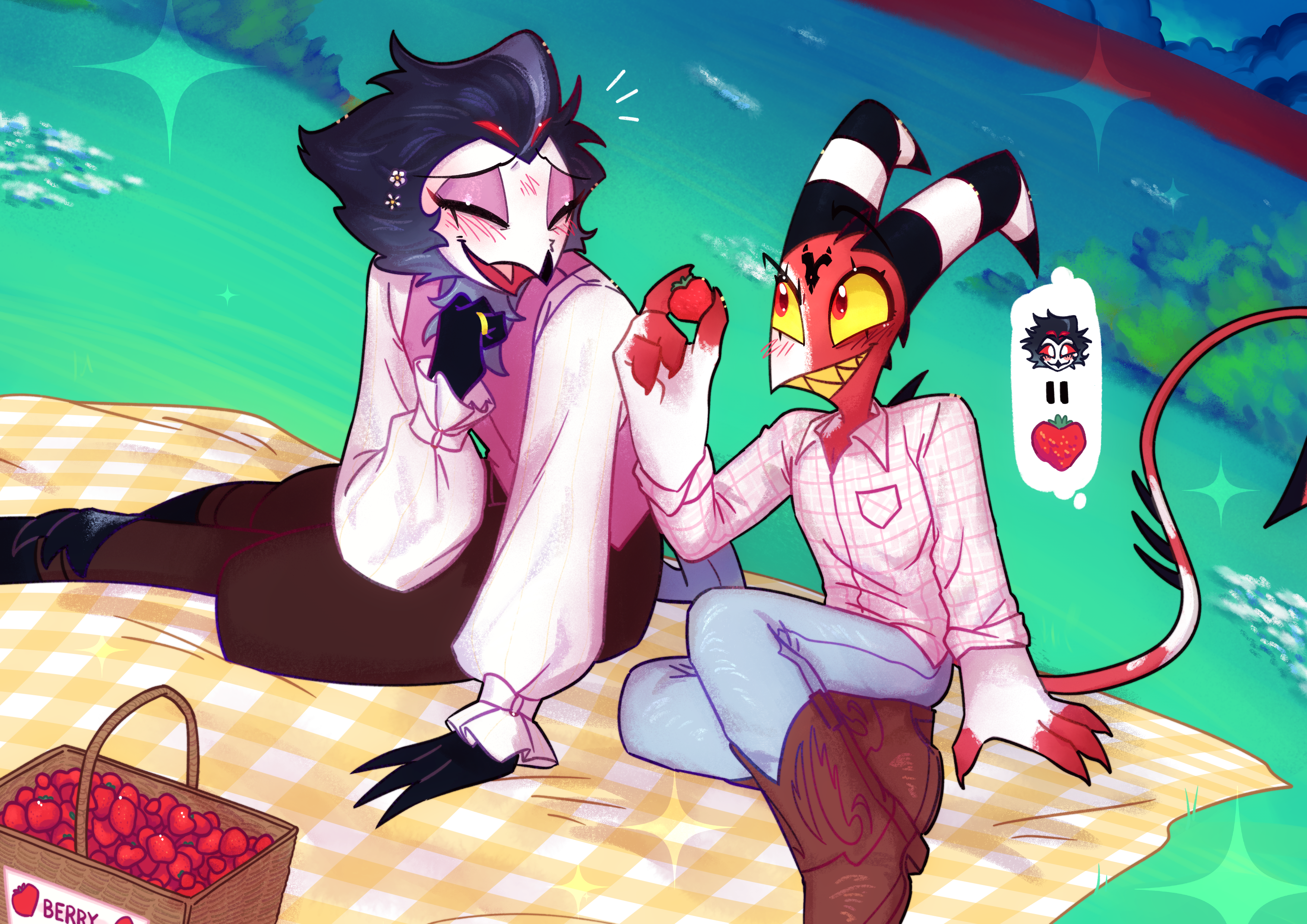 Stolas and Blitz sitting on a picnic blanket eating strawberries. 