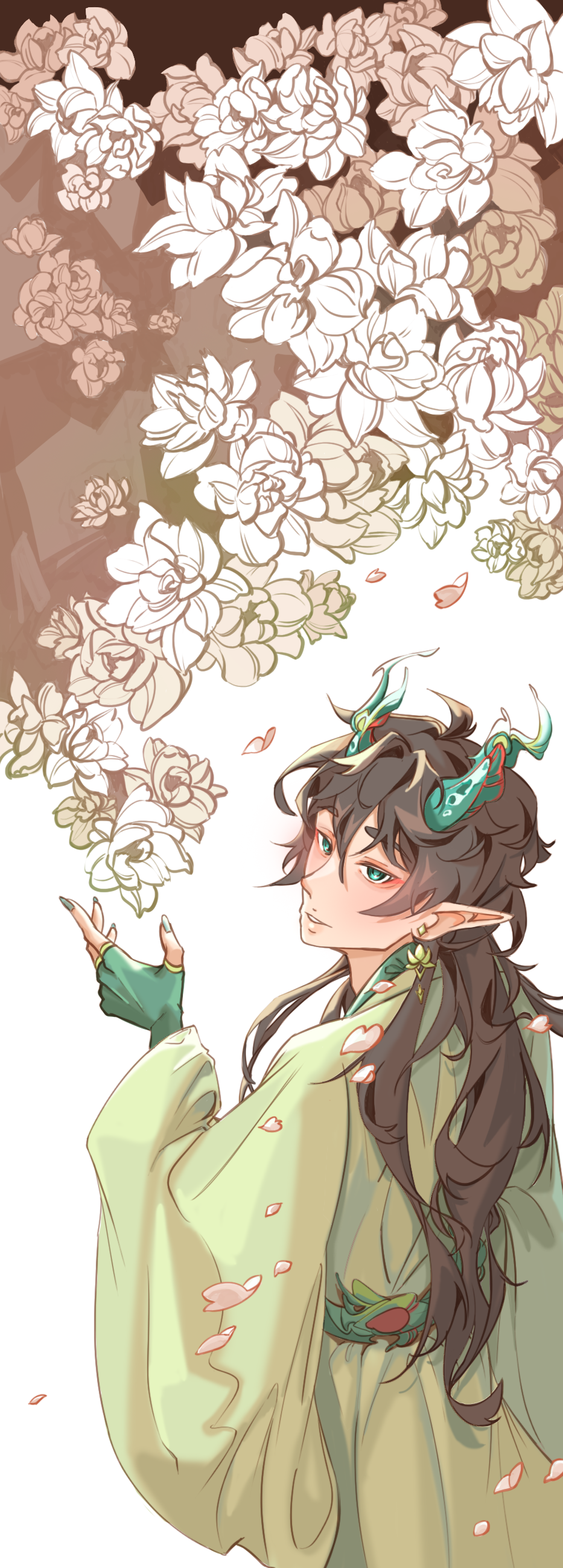 Dan Heng holds up a string of jasmine flowers.