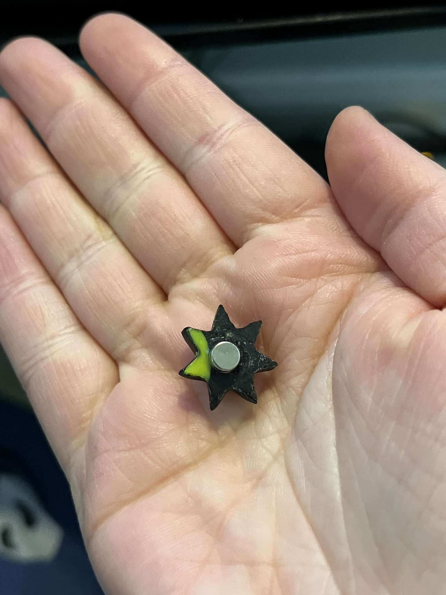 The fridge magnet backside.