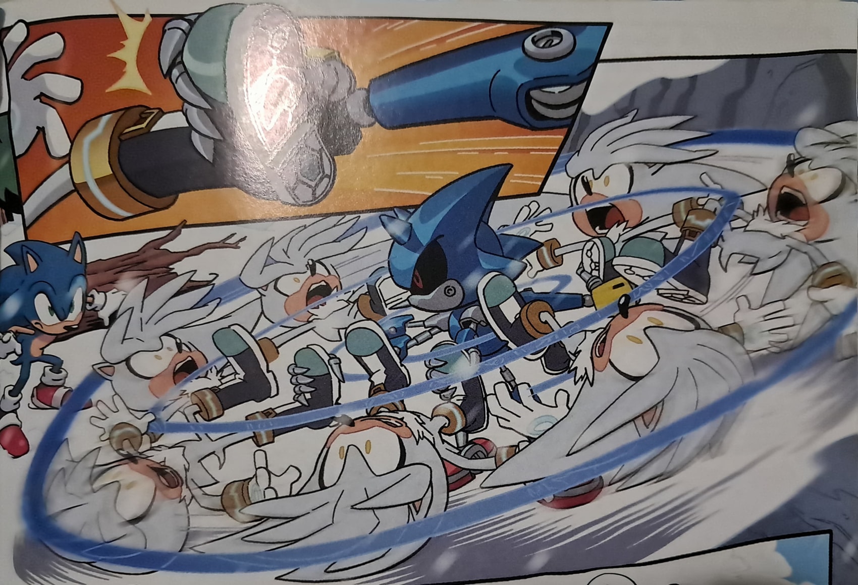 Panel 1: Silver getting grabbed by the foot by Metal Sonic. Panel 2: Metal whirls him in a circle like he's a lasso, leaving afterimages of Silver making silly, distorted expressions. Panel 3: Silver shrieks, AIYEEEEEEE! as his silouhette is flung into the distance.