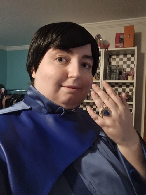 Me in my Hotaro cosplay raising up my hand.