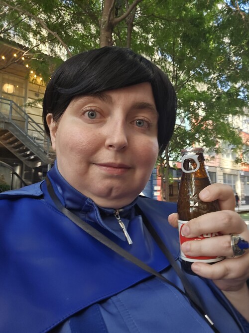 Me holding a bottle of oronamin c.