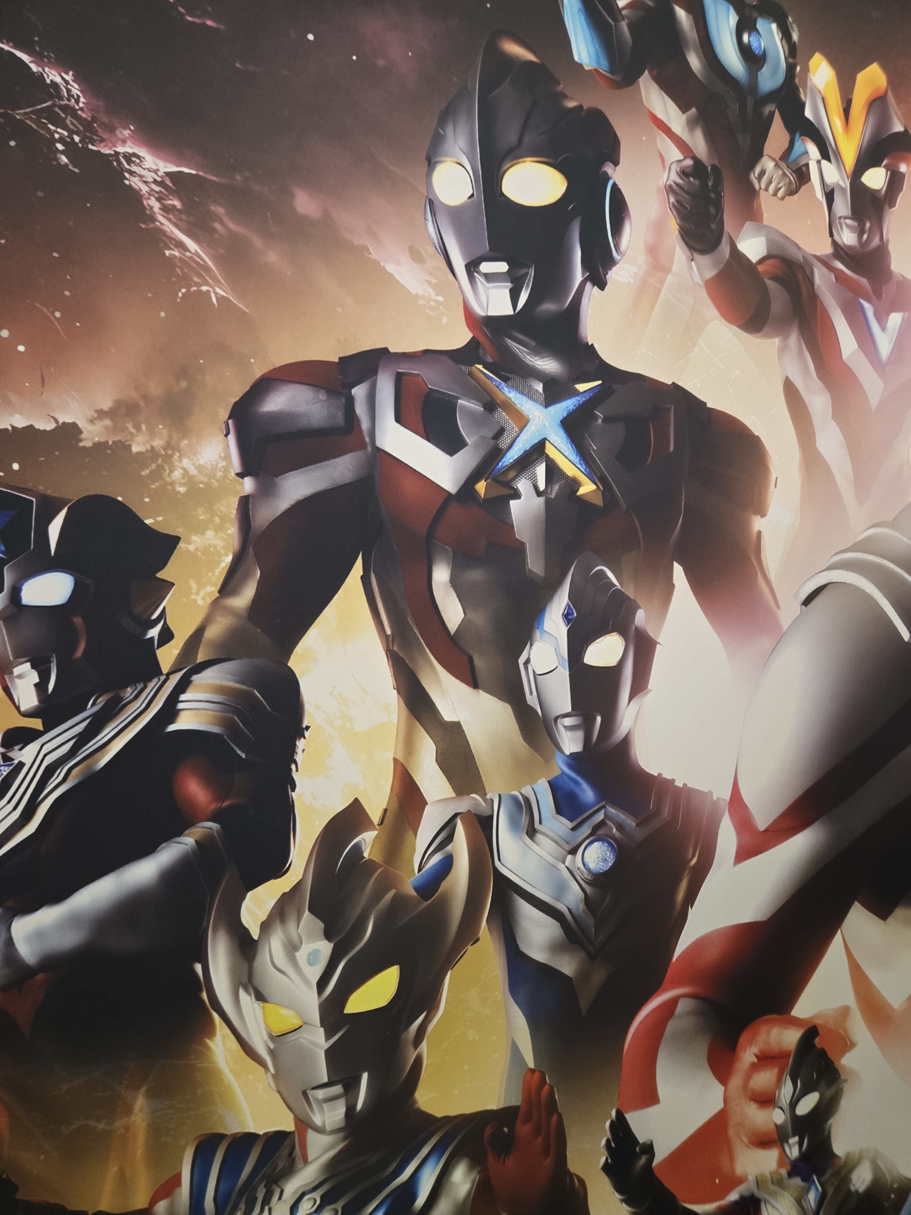 Various Ultramen on a wall.