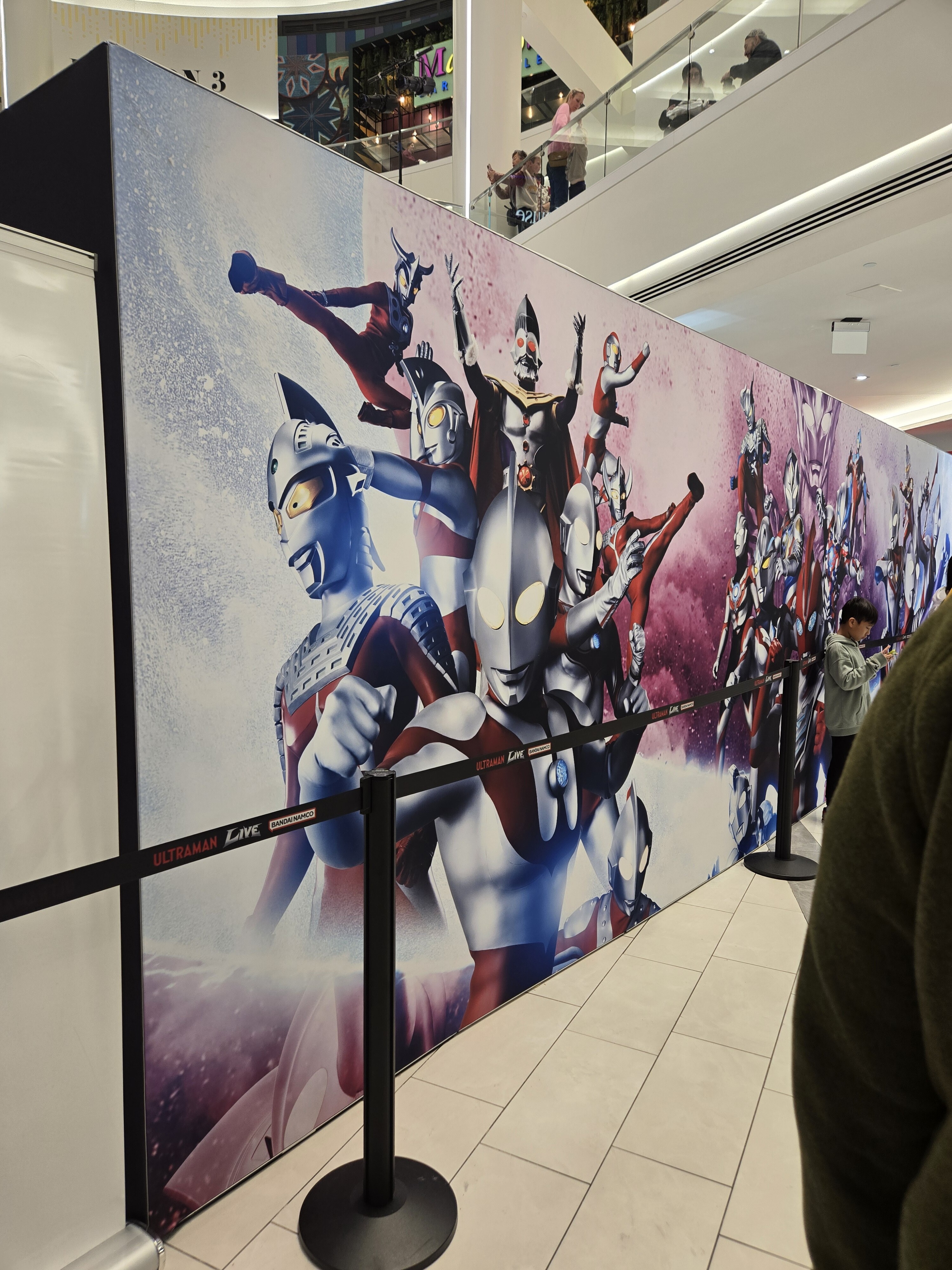 Various Ultramen on a wall.